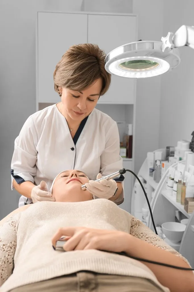 Microneedling collagen induction therapy procedure close-up — SOS Aesthetics